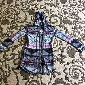 A long colorful sweater